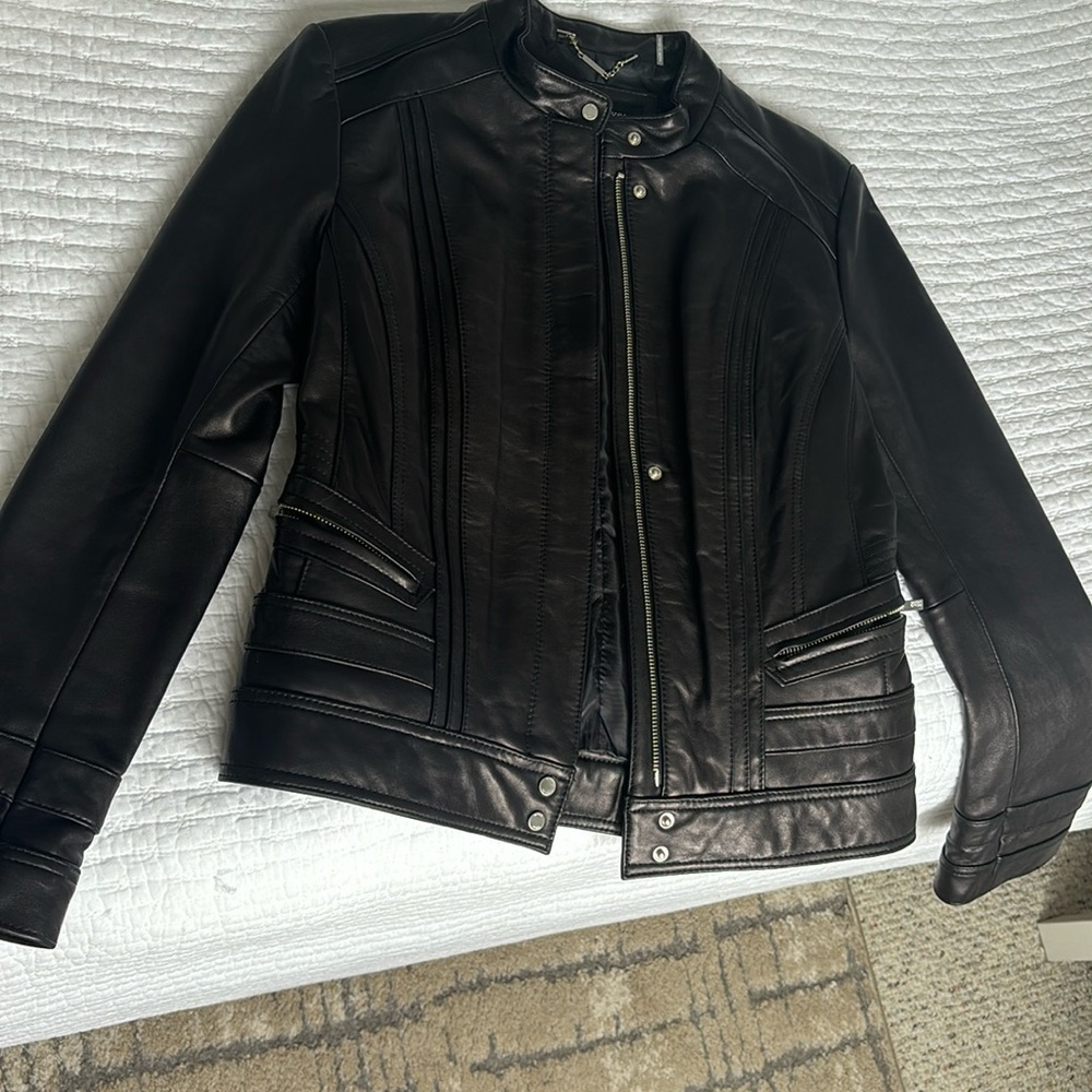 Black Rivet leather jacket, pre owned.